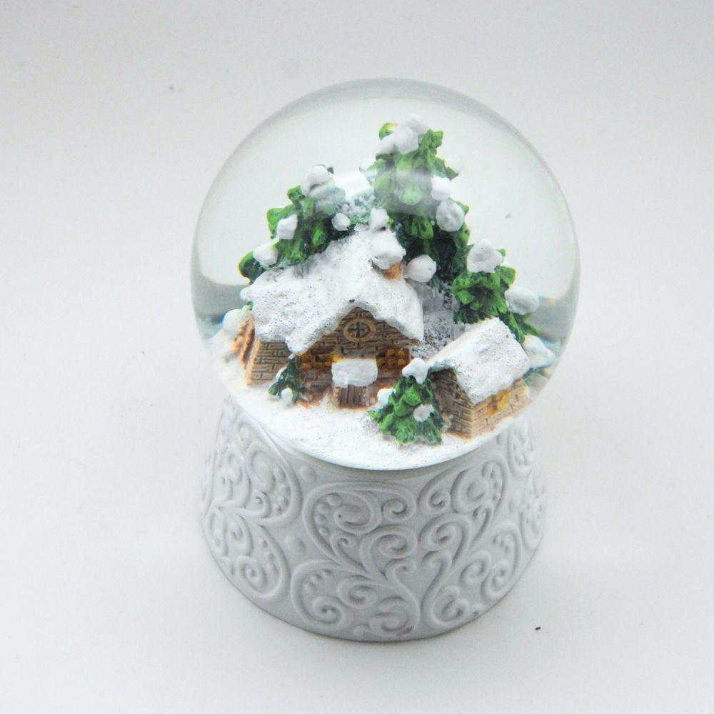 Edle Schneekugel Hüttenzauber Berghütte auf weißem Ornamentsockel 100 mm Durchmesser mit Spieluhr - Schneekugelhaus